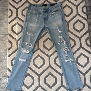 Ripped distressed light blue jeans